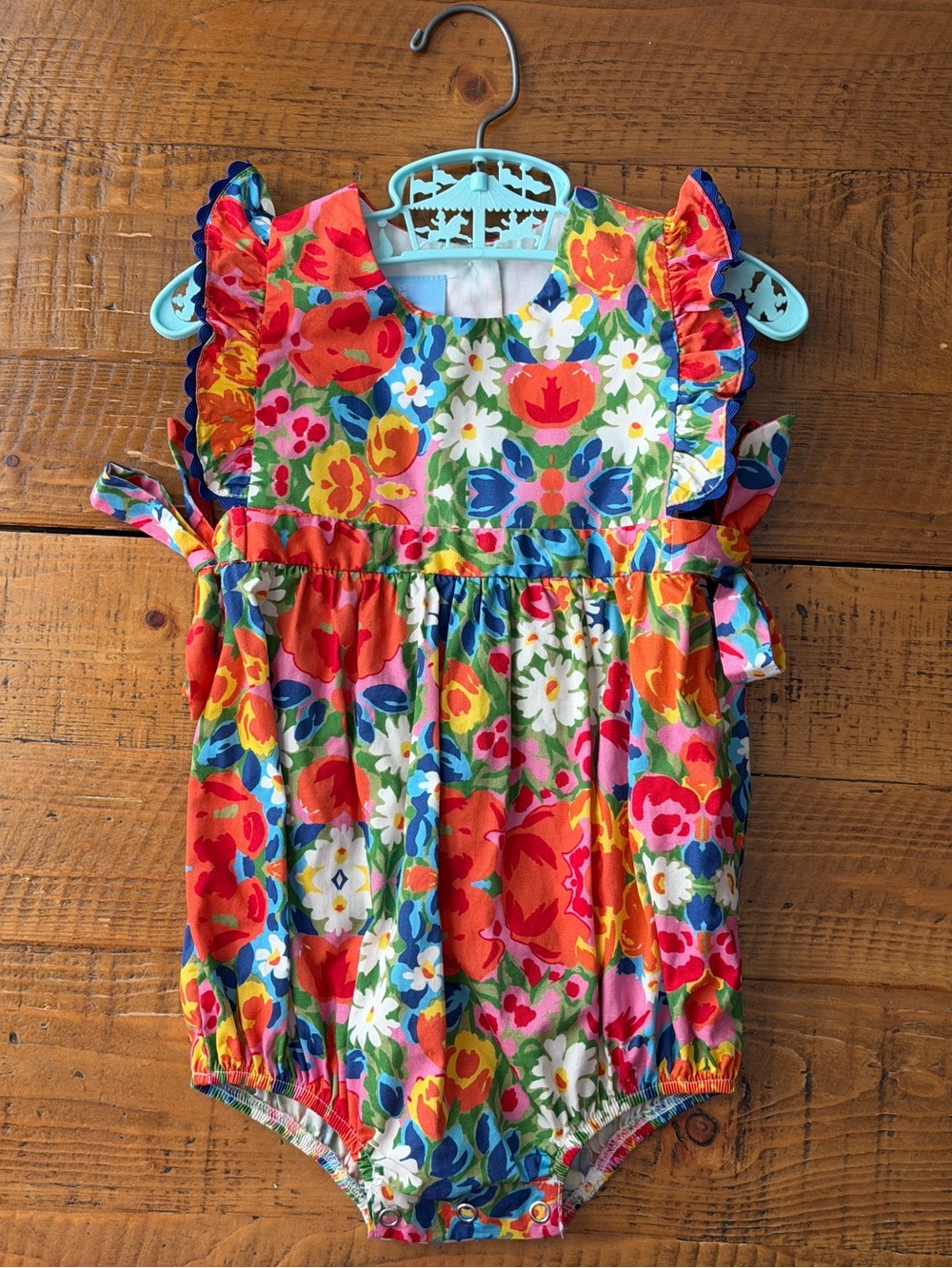 bella bliss Floral Ruffle bubble romper in Bright Multi-Color